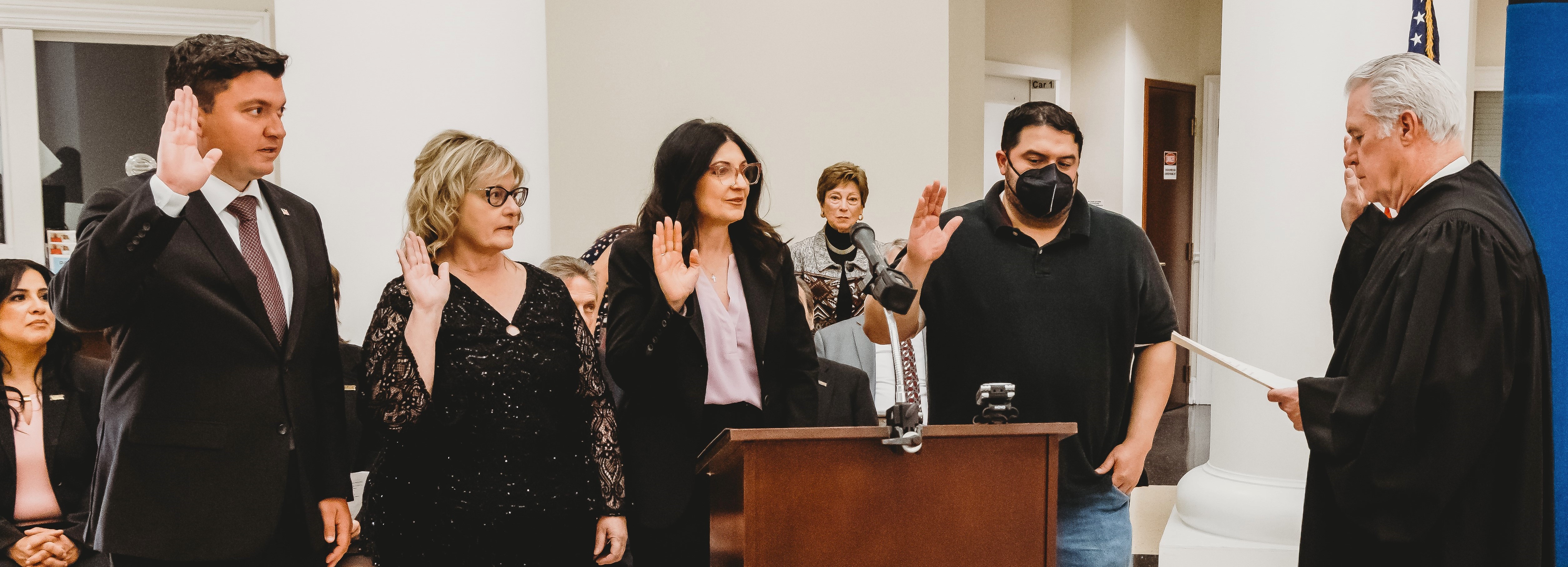 board ceremony image showing new trustees being sworn in