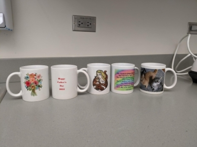 Photo of 5 mugs decorated in the Creative Studio