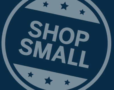 white shop small circular logo on blue background