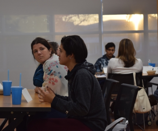 Photo of patrons in the Large Meeting Room having conversations