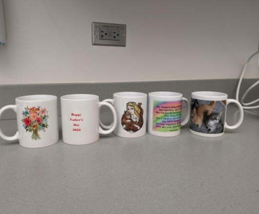 Photo of 5 mugs decorated in the Creative Studio