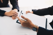 Resume Help - person reading resume at table