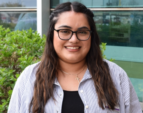 Social Services Librarian Yesenia smiling in her headshot